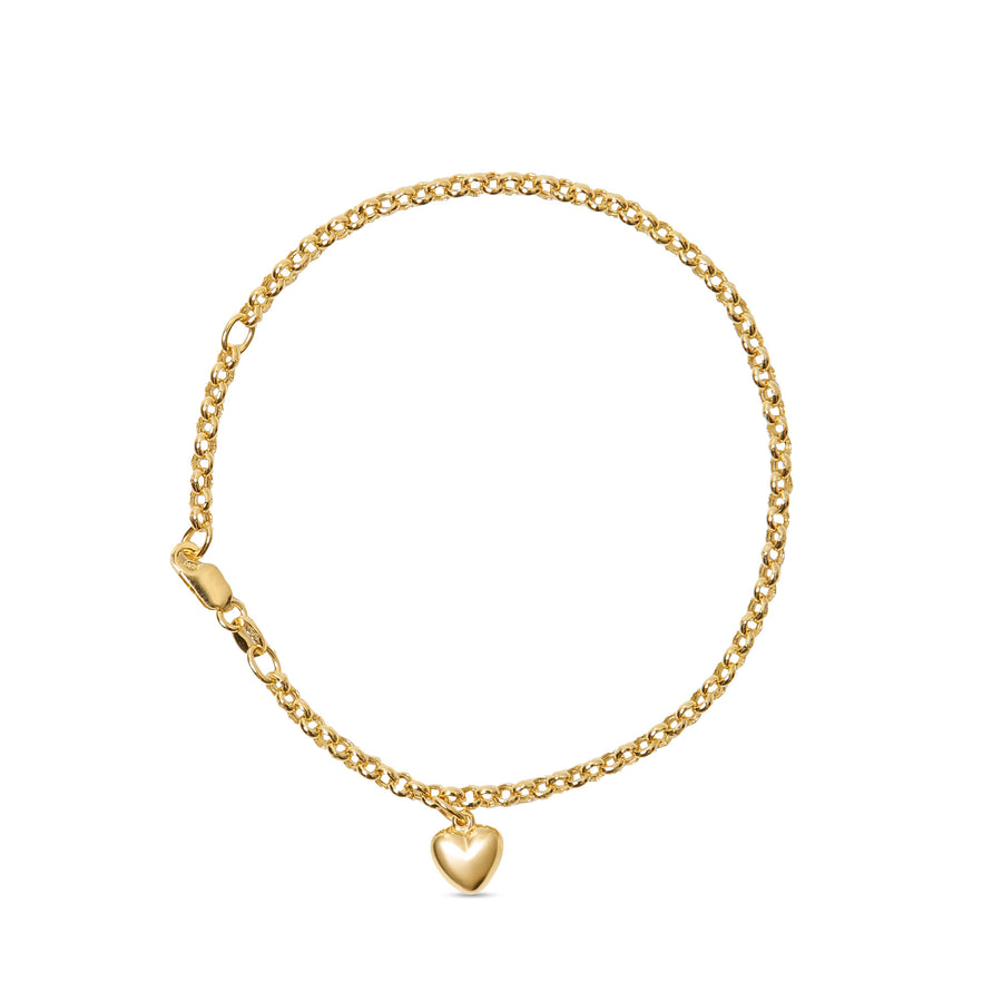 18-karat yellow gold Cuban link bracelet with a dainty heart pendant, weighing 2.78 grams. A timeless and elegant accessory for daily wear.