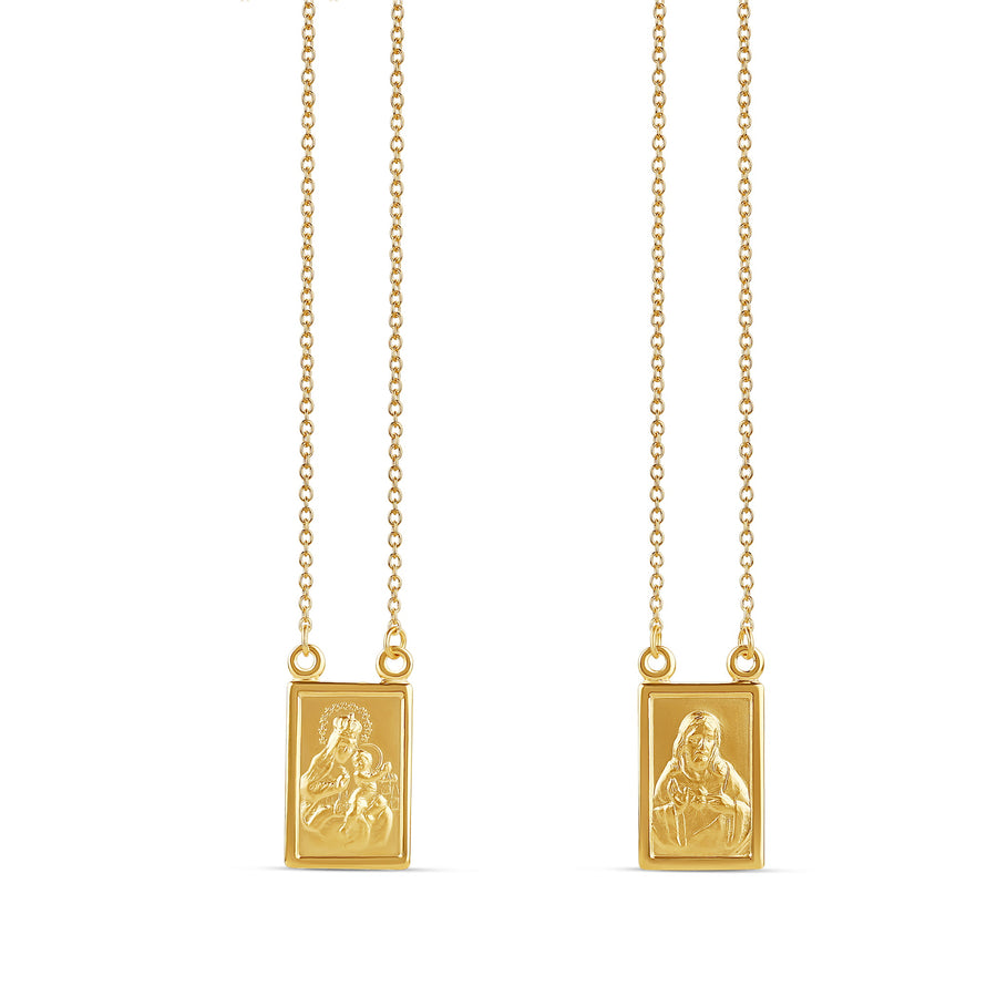 18-karat yellow gold scapular necklace with detailed religious engravings on rectangular pendants, weighing 6.40 grams. A timeless and meaningful symbol of faith.