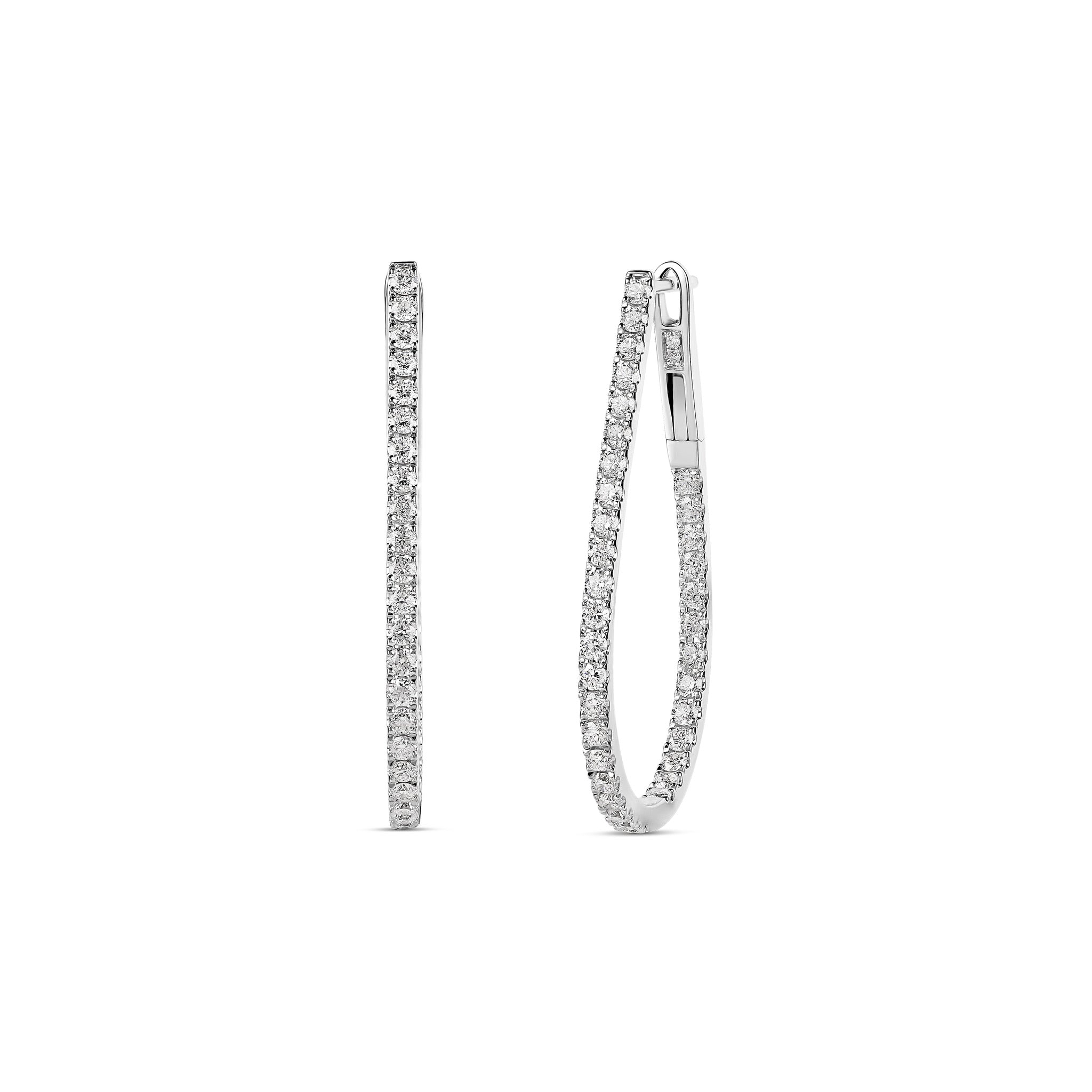 18-karat white gold teardrop hoop earrings featuring 1.02 carats of diamonds, crafted with 4.68 grams of gold. A sleek and elegant design for a sophisticated look.